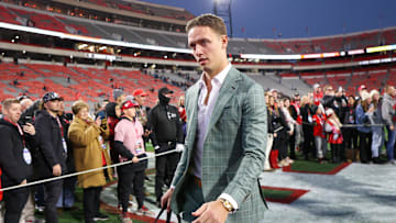 Nov 29, 2024; Athens, Georgia, USA; Georgia Bulldogs quarterback Carson Beck (15) walks into Sanford Stadium before a game against the Georgia Tech Yellow Jackets. Mandatory Credit: Brett Davis-Imagn Images