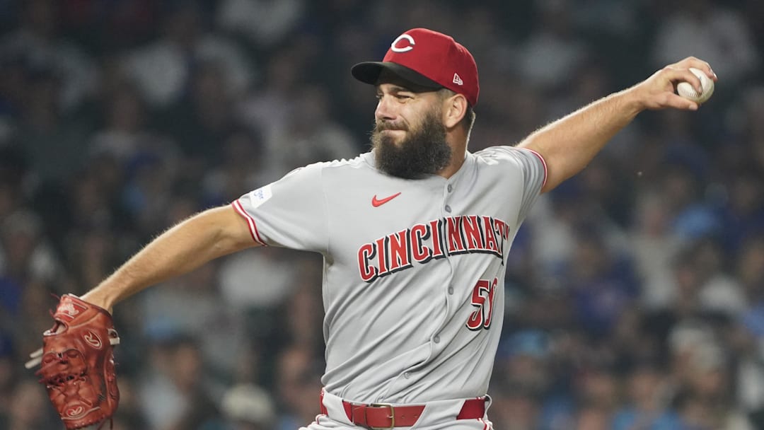 Sam Moll (50) throws against the Chicago Cubs during the ninth inning at Wrigley Field. 