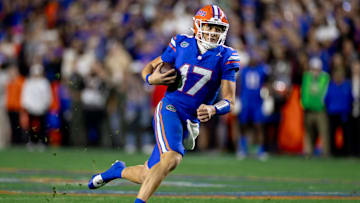 Florida Gators quarterback Max Brown (17) rushes with the ball during the second half against the Florida State Seminoles at Steve Spurrier Field at Ben Hill Griffin Stadium in Gainesville, FL on Saturday, November 25, 2023. [Matt Pendleton/Gainesville Sun]