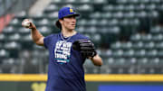 Sep 25, 2025; Seattle, Washington, USA; Seattle Mariners starting pitcher Bryan Woo (22) throws in the outfield before a game against the Colorado Rockies at T-Mobile Park. Mandatory Credit: Joe Nicholson-Imagn Images