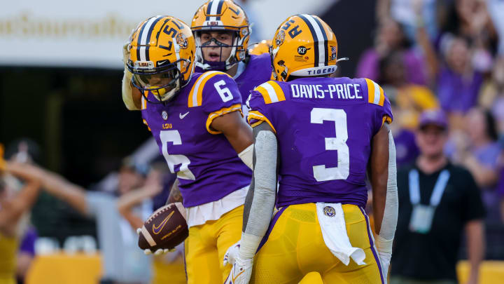 Sep 18, 2021; Baton Rouge, Louisiana, USA;  LSU Tigers wide receiver Deion Smith (6) reacts to making a touchdown against Central Michigan Chippewas during the first half at Tiger Stadium. Mandatory Credit: Stephen Lew-USA TODAY Sports