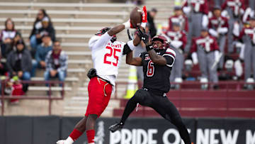Jax State Gamecock Fred Perry and NMSU Jonathan Brady reach for the ball during a NMSU football game on Wednesday, May 22, 2023, at the Aggie Memorial Stadium.