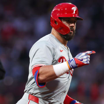 Jun 11, 2024; Boston, Massachusetts, USA; Philadelphia Phillies designated hitter Kyle Schwarber (12) celebrates after hitting a solo home run during the fifth inning against the Boston Red Sox at Fenway Park