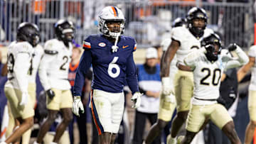 Cam Ross #6 of the Virginia Cavaliers walks off the field at the end of the second half during a game against the Wake Forest Demon Deacons at Scott Stadium on November 8, 2025 in Charlottesville, Virginia.