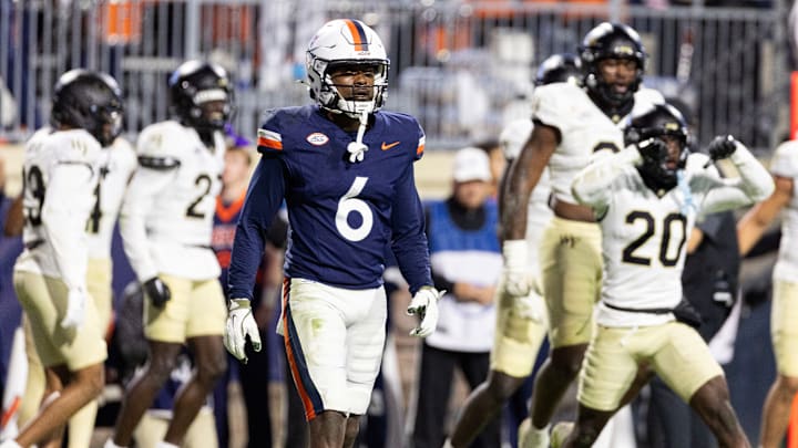 Cam Ross #6 of the Virginia Cavaliers walks off the field at the end of the second half during a game against the Wake Forest Demon Deacons at Scott Stadium on November 8, 2025 in Charlottesville, Virginia.