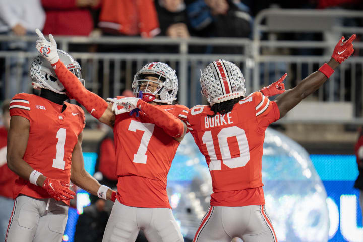 Nov 18, 2023; Columbus, Ohio, USA; 
Ohio State Buckeyes cornerback Jordan Hancock (7) celebrates an