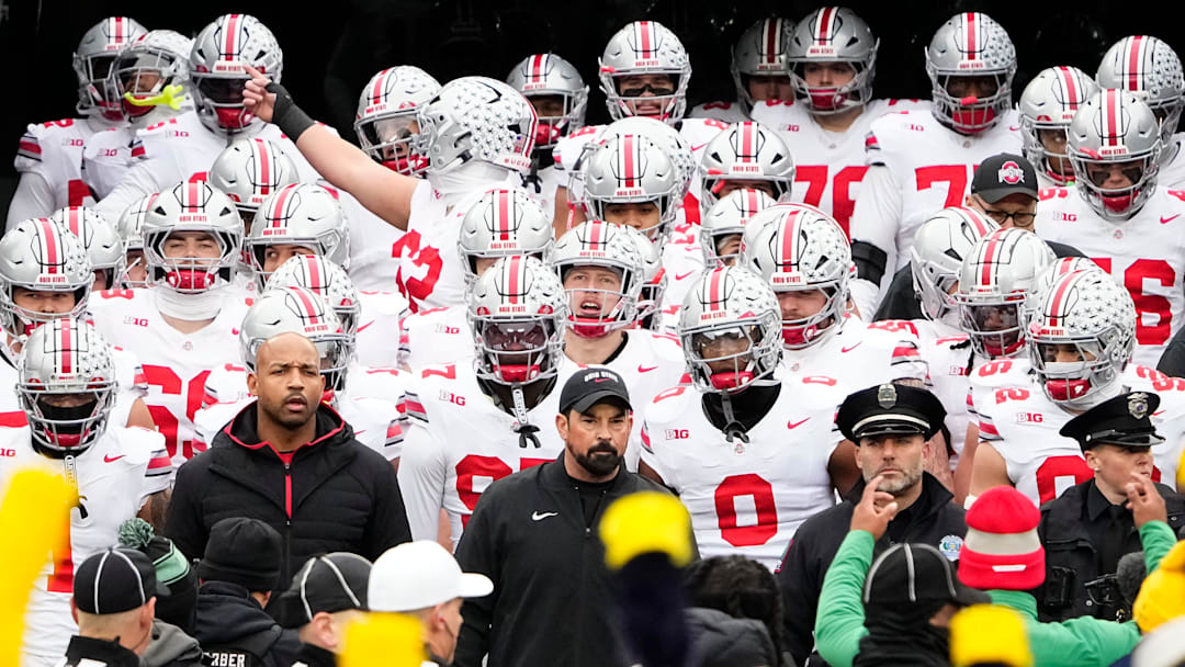 Ohio State Buckeyes head coach Ryan Day leads his team onto the field for the NCAA football game against the Michigan Wolverines at Michigan Stadium in Ann Arbor, Mich. on Nov. 29, 2025. Ohio State won 27-9.