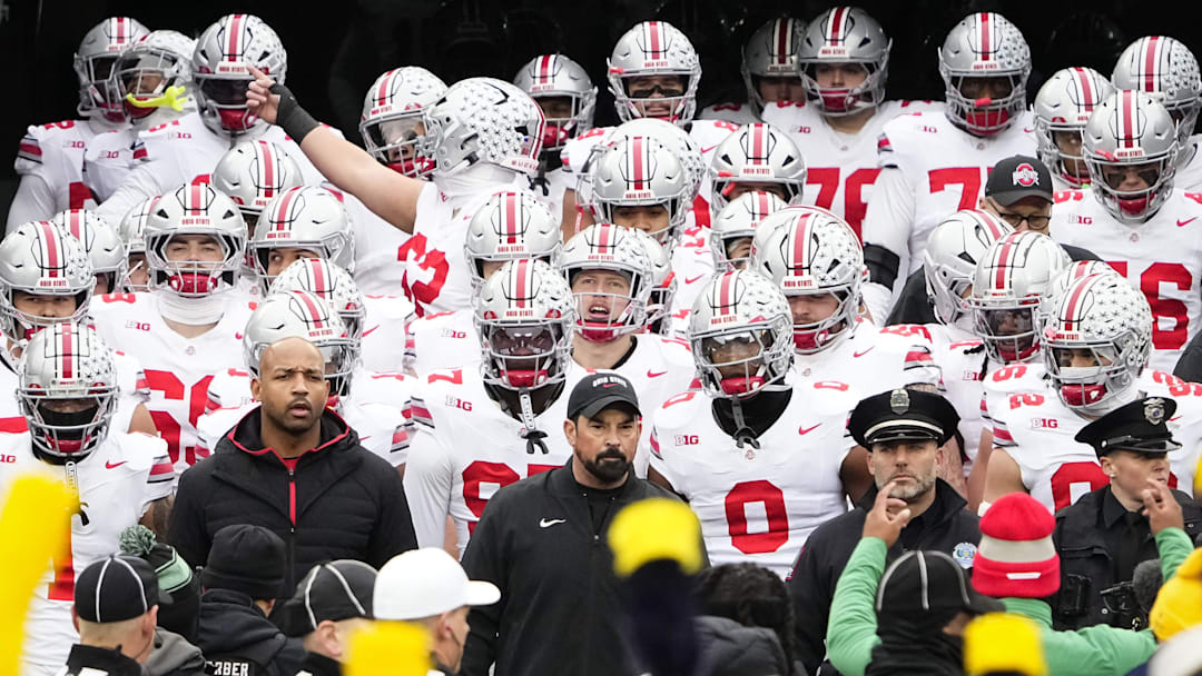 Ohio State Buckeyes head coach Ryan Day leads his team onto the field for the NCAA football game against the Michigan Wolverines at Michigan Stadium in Ann Arbor, Mich. on Nov. 29, 2025. Ohio State won 27-9.