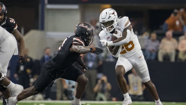 Dec 2, 2023; Arlington, TX, USA; Texas Longhorns running back Quintrevion Wisner (26) and Oklahoma