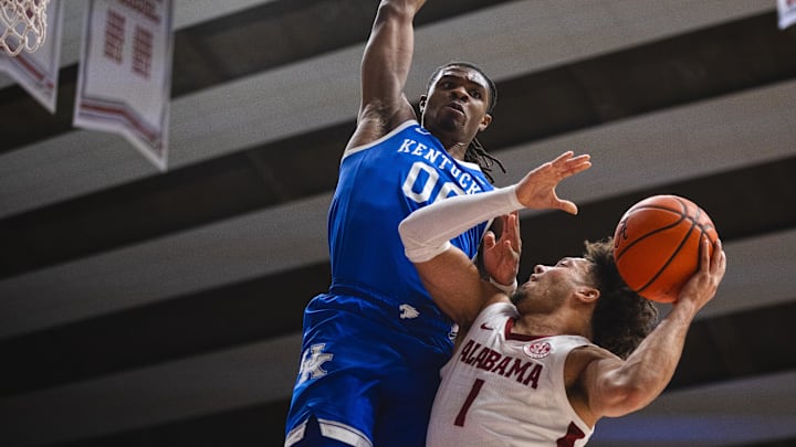 Feb 22, 2025; Tuscaloosa, Alabama, USA; Alabama Crimson Tide guard Mark Sears (1) shoots against Kentucky Wildcats guard Otega Oweh (00) during the first half at Coleman Coliseum. Mandatory Credit: Will McLelland-Imagn Images