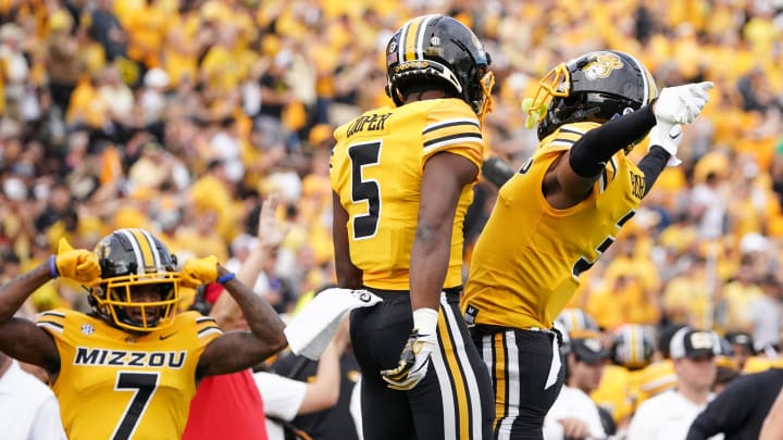 Oct 22, 2022; Columbia, Missouri, USA; Missouri Tigers wide receiver Luther Burden III (3) celebrates wide receiver Mookie Cooper (5) after scoring against the Vanderbilt Commodores during the first half of the game at Faurot Field at Memorial Stadium. Mandatory Credit: Denny Medley-USA TODAY Sports