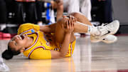 USC Trojans guard JuJu Watkins grabs her knee after falling g to the floor during the NCAA Tournament.