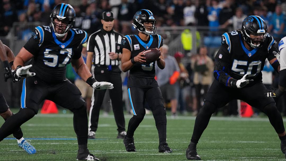 Carolina Panthers quarterback Bryce Young (9) drops back to pass 