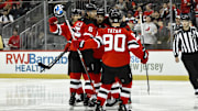 Oct 19, 2024; Newark, New Jersey, USA; New Jersey Devils center Nico Hischier (13) celebrates with teammates after scoring a goal against the Washington Capitals during the second period at Prudential Center. Mandatory Credit: John Jones-Imagn Images