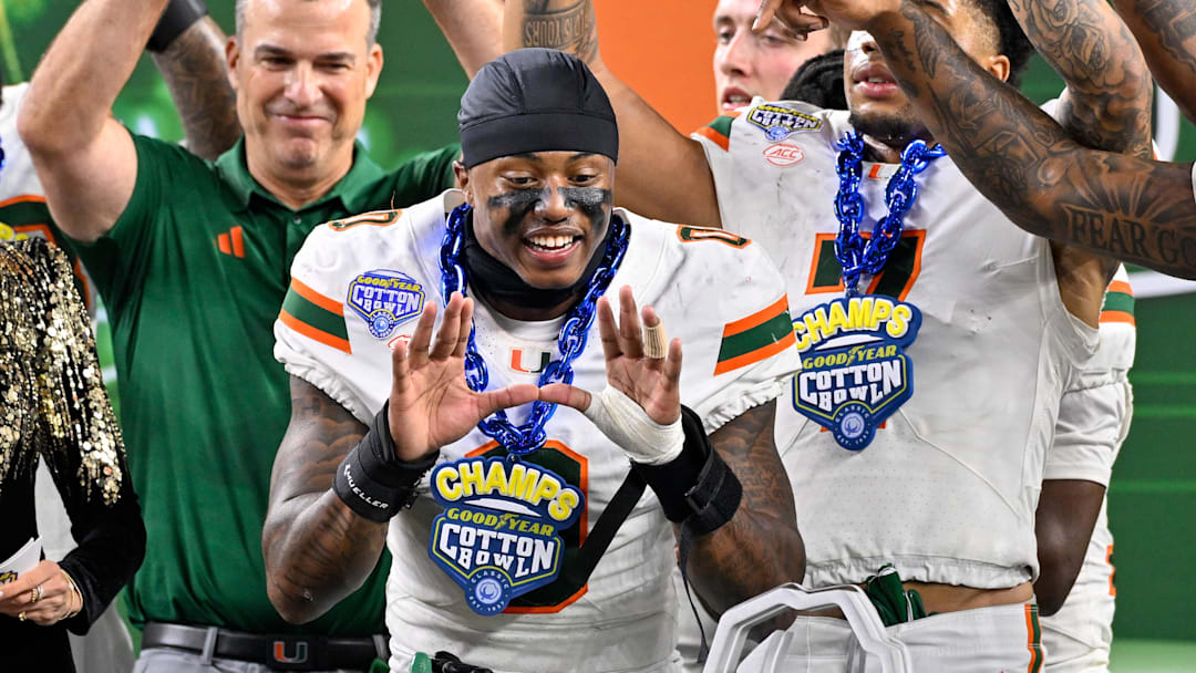 Dec 31, 2025; Arlington, TX, USA; Miami Hurricanes defensive back Keionte Scott (0) celebrates after the 2025 Cotton Bowl and quarterfinal game of the College Football Playoff at AT&T Stadium.