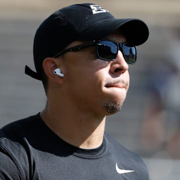 Purdue Boilermakers head coach Ryan Walters makes his way to the field 