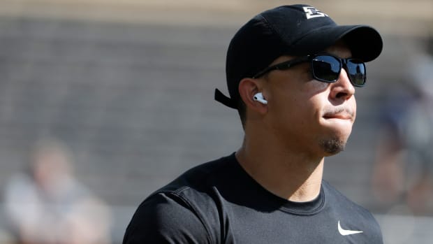 Purdue Boilermakers coach Ryan Walters makes his way to the field 