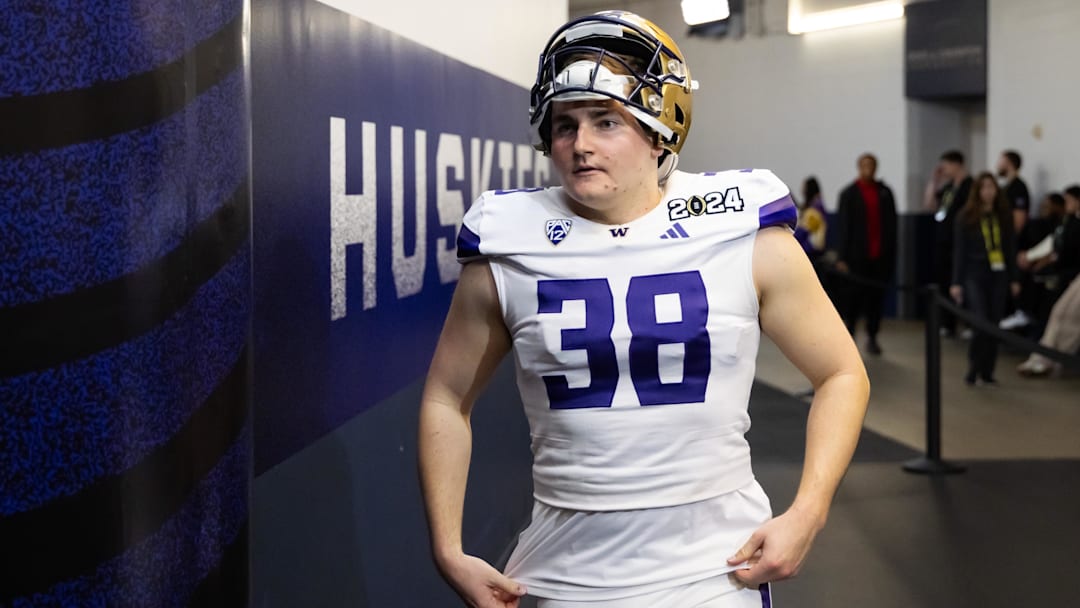 Jan 8, 2024; Houston, TX, USA; Washington Huskies punter Jack McCallister (38) against the Michigan Wolverines during the 2024 College Football Playoff national championship game at NRG Stadium. Mandatory Credit: Mark J. Rebilas-Imagn Images