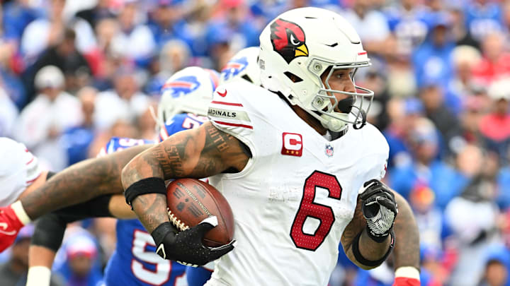 Sep 8, 2024; Orchard Park, New York, USA; Arizona Cardinals running back James Conner (6) runs with the ball against the Buffalo Bills in the third quarter at Highmark Stadium. Mandatory Credit: Mark Konezny-Imagn Images