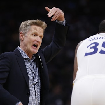 Golden State Warriors head coach Steve Kerr and forward Kevin Durant (35) against the Sacramento Kings at Golden 1 Center.