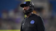 Aug 30, 2025; Pasadena, California, USA; UCLA Bruins head coach DeShaun Foster watches game action against the Utah Utes during the second half at Rose Bowl. Mandatory Credit: Gary A. Vasquez-Imagn Images