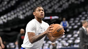 Mar 21, 2025; Dallas, Texas, USA; Detroit Pistons guard Marcus Sasser (25) warms up before the game between the Dallas Mavericks and the Detroit Pistons at the American Airlines Center. Mandatory Credit: Jerome Miron-Imagn Images