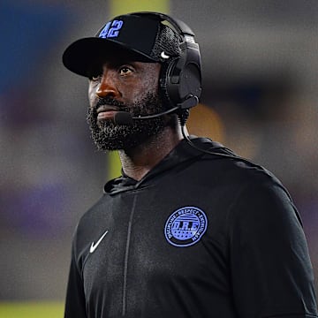 Aug 30, 2025; Pasadena, California, USA; UCLA Bruins head coach DeShaun Foster watches game action against the Utah Utes during the second half at Rose Bowl. Mandatory Credit: Gary A. Vasquez-Imagn Images