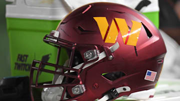  Washington Commanders helmet sits on the sidelines against the Philadelphia Eagles at Lincoln Financial Field. 