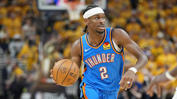 Oklahoma City Thunder guard Shai Gilgeous-Alexander (2) dribbles the ball against the Indiana Pacers during the first half during game four of the 2025 NBA Finals at Gainbridge Fieldhouse.