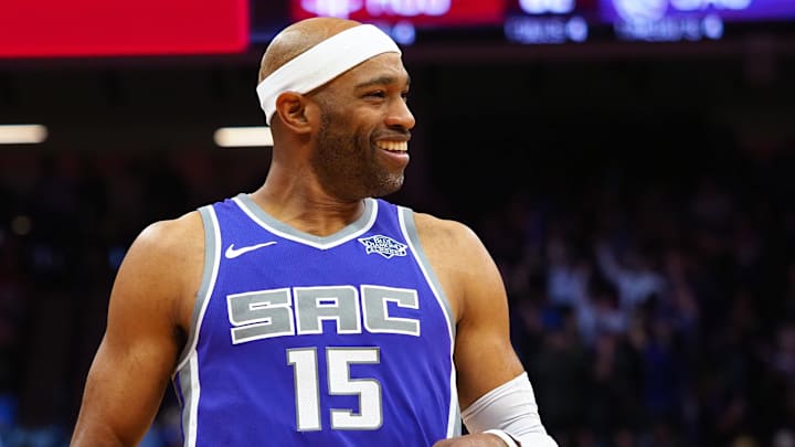 Apr 11, 2018; Sacramento, CA, USA; Sacramento Kings guard Vince Carter (15) smiles between plays against the Houston Rockets during the third quarter at Golden 1 Center. Mandatory Credit: Kelley L Cox-Imagn Images