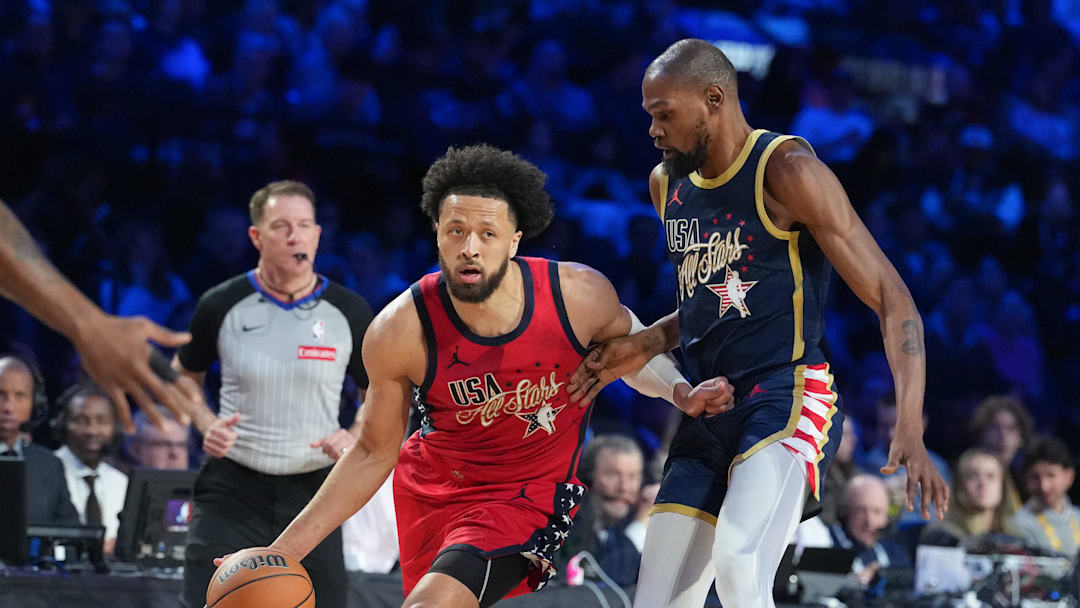 Team USA Stars guard Cade Cunningham (2) of the Detroit Pistons drives the ball against Team USA Stripes forward Kevin Durant (7) of the Houston Rockets in game two during the 75th NBA All Star Game at Intuit Dome on Feb 15, 2026.