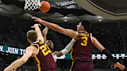 Jan 18, 2024; East Lansing, Michigan, USA; Michigan State Spartans guard Tyson Walker (2) gets blocked by Minnesota Golden Gophers forward Dawson Garcia (3) and forward Parker Fox (23) during the second half at Jack Breslin Student Events Center. Mandatory Credit: Dale Young-Imagn Images