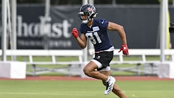 Jun 10, 2025; Houston, TX, USA; Houston Texans wide receiver Jayden Higgins (81) participates in a drill during an NFL football minicamp at NRG Stadium. Mandatory Credit: Maria Lysaker-Imagn Images 