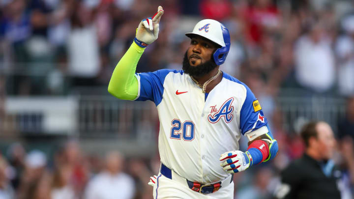 Aug 3, 2024; Atlanta, Georgia, USA; Atlanta Braves designated hitter Marcell Ozuna (20) reacts after a home run against the Miami Marlins in the third inning at Truist Park. Mandatory Credit: Brett Davis-USA TODAY Sports
