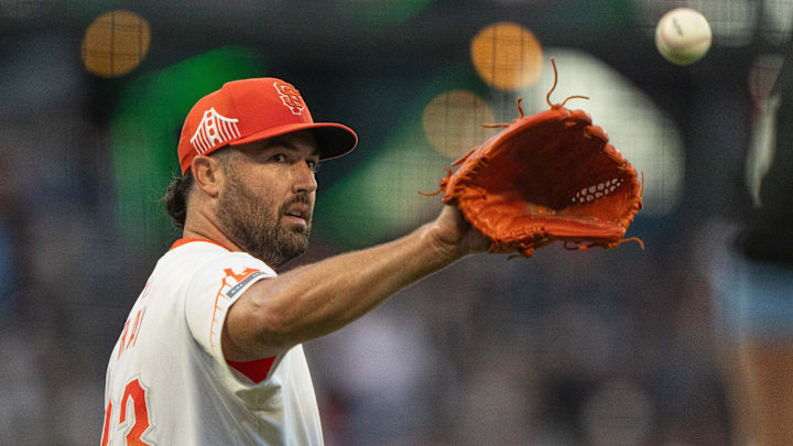 Aug 20, 2024; San Francisco, California, USA; San Francisco Giants pitcher Robbie Ray (23) catches the ball during the third inning against the Chicago White Sox at Oracle Park. Aug 20, 2024; San Francisco, California, USA; San Francisco Giants pitcher Robbie Ray (23) catches the ball during the third inning against the Chicago White Sox at Oracle Park.