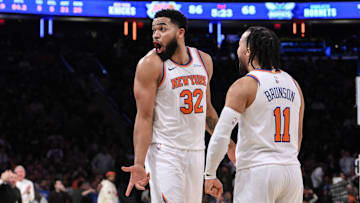 Dec 5, 2024; New York, New York, USA; New York Knicks center Karl-Anthony Towns (32) and New York Knicks guard Jalen Brunson (11) react during the second half against the Charlotte Hornets at Madison Square Garden. Mandatory Credit: John Jones-Imagn Images