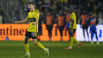 Nov 2, 2025; Columbus, Ohio, USA;  Columbus Crew midfielder Sean Zawadzki (25) reacts to the goal scored by defender Marcelo Herrera (2) in the game against FC Cincinnati in the second half at Lower.com Field. Mandatory Credit: Aaron Doster-Imagn Images