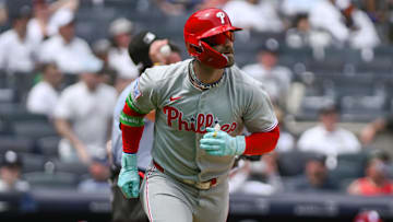 Philadelphia Phillies first baseman Bryce Harper runs the bases after hitting a solo home run against the New York Yankees.
