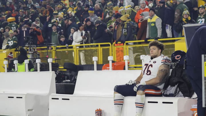 Jan 7, 2024; Green Bay, Wisconsin, USA; Chicago Bears offensive tackle Teven Jenkins (76) sits alone