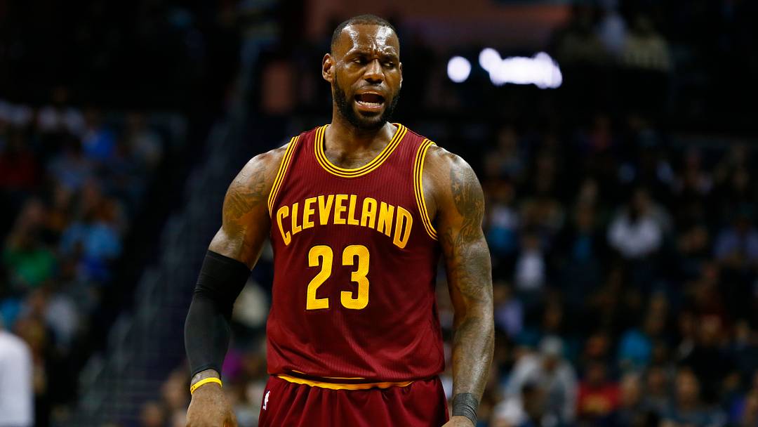 Mar 24, 2017; Charlotte, NC, USA; Cleveland Cavaliers forward LeBron James (23) talks with head coach Tyronn Lue (not pictured) in the first half against the Charlotte Hornets at Spectrum Center. The Cavs defeated the Hornets 112-105. 
