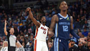 Oct 24, 2025; Memphis, Tennessee, USA; Miami Heat center Bam Adebayo (13) reacts after attempting a three point basket during the first quarter against the Memphis Grizzlies at FedExForum. Mandatory Credit: Petre Thomas-Imagn Images