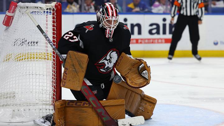 Nov 1, 2024; Buffalo, New York, USA;  Buffalo Sabres goaltender Devon Levi (27) makes a save during the third period against the New York Islanders at KeyBank Center. Mandatory Credit: Timothy T. Ludwig-Imagn Images