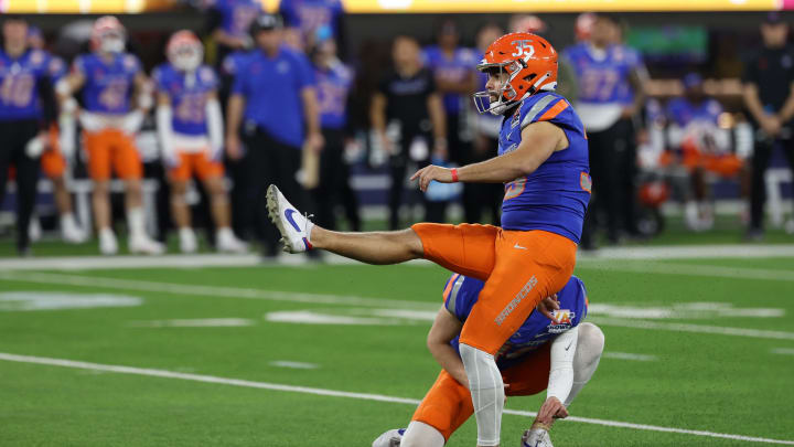 Dec 16, 2023; Inglewood, CA, USA; Boise State Broncos place kicker Jonah Dalmas (35) kicks 33 yard field goal in the first quarter against the UCLA Bruins during the LA Bowl at SoFi Stadium. Mandatory Credit: Kiyoshi Mio-USA TODAY Sports