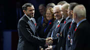 Nov 8, 2024; Toronto, Ontario, CAN; Class of 2024 Hockey Hall of Fame inductee Pavel Datsyuk (left) is greeted by Hockey Hall of Fame members before a game against between the Detroit Red Wings and Toronto Maple Leafs during the first period at Scotiabank Arena. Mandatory Credit: John E. Sokolowski-Imagn Images