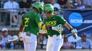 Jun 9, 2024; College Station, TX, USA; Oregon outfielder Anson Aroz (77) celebrates after hitting a solo home run during the first inning against Texas A&M at Olsen Field, Blue Bell Park.