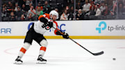 Dec 28, 2024; Anaheim, California, USA;  Philadelphia Flyers left wing Joel Farabee (86) shoots and scores an empty net goal during the third period against the Anaheim Ducks at Honda Center. Mandatory Credit: Kiyoshi Mio-Imagn Images