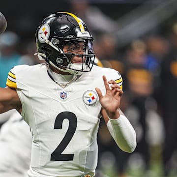 Sep 8, 2024; Atlanta, Georgia, USA; Pittsburgh Steelers quarterback Justin Fields (2) passes the ball against the Atlanta Falcons during the first quarter at Mercedes-Benz Stadium. Mandatory Credit: Dale Zanine-Imagn Images