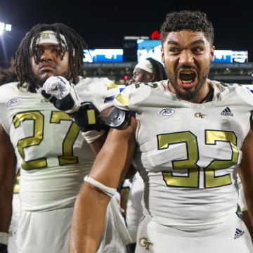 Aug 31, 2024; Atlanta, Georgia, USA; Georgia Tech Yellow Jackets defensive lineman Sylvain Yondjouen (32) celebrates after a victory against Georgia State Panthers at Bobby Dodd Stadium at Hyundai Field. Mandatory Credit: Brett Davis-USA TODAY Sports