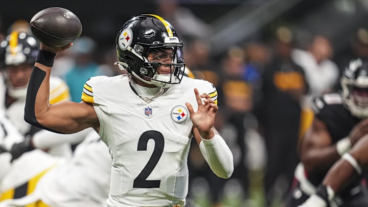 Sep 8, 2024; Atlanta, Georgia, USA; Pittsburgh Steelers quarterback Justin Fields (2) passes the ball against the Atlanta Falcons during the first quarter at Mercedes-Benz Stadium. Mandatory Credit: Dale Zanine-Imagn Images