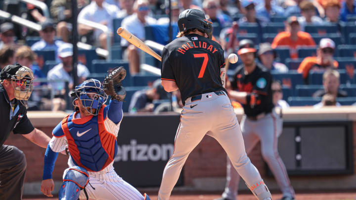 Baltimore Orioles second baseman Jackson Holliday (7) is hit by a pitch during the sixth inning against the New York Mets at Citi Field on Aug 21.